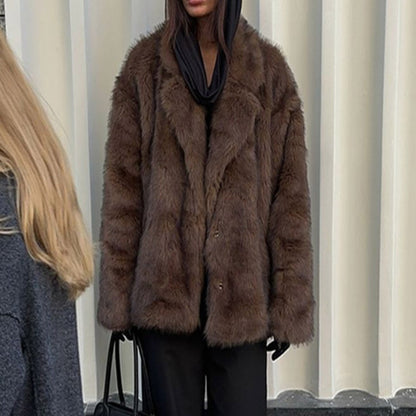 Faux fur coat with polo collar and solid color.