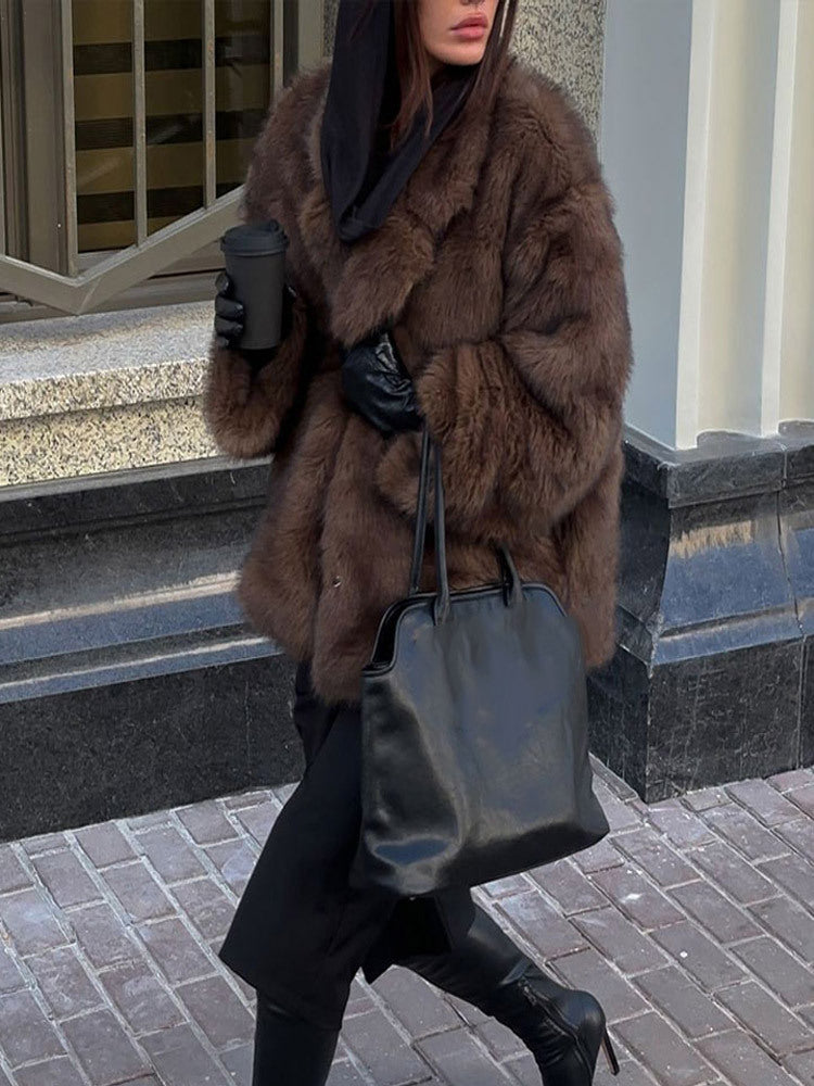 Faux fur coat with polo collar and solid color.